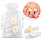White daisy floral toe separators in organza bag with pedicure example