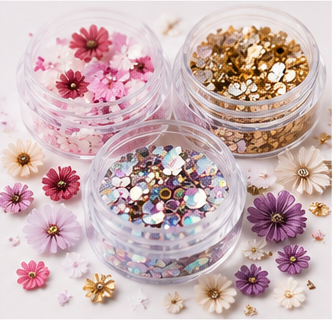 Glitter and dried flowers nail art