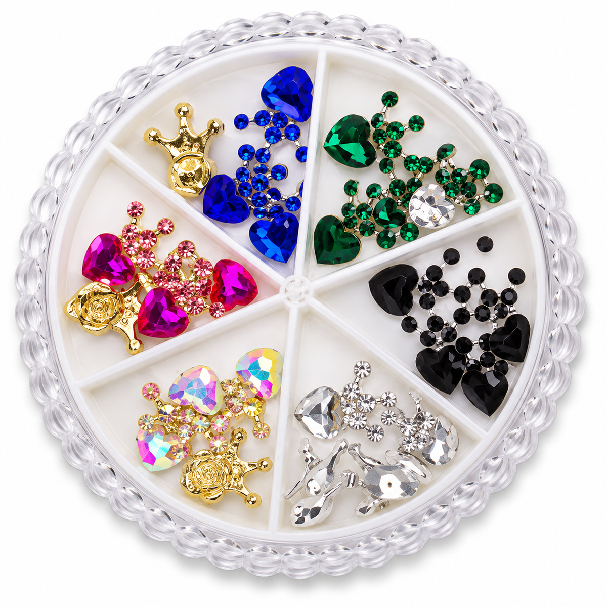 Multicolour heart rhinestone and crown nail art charms in compartment wheel on white background